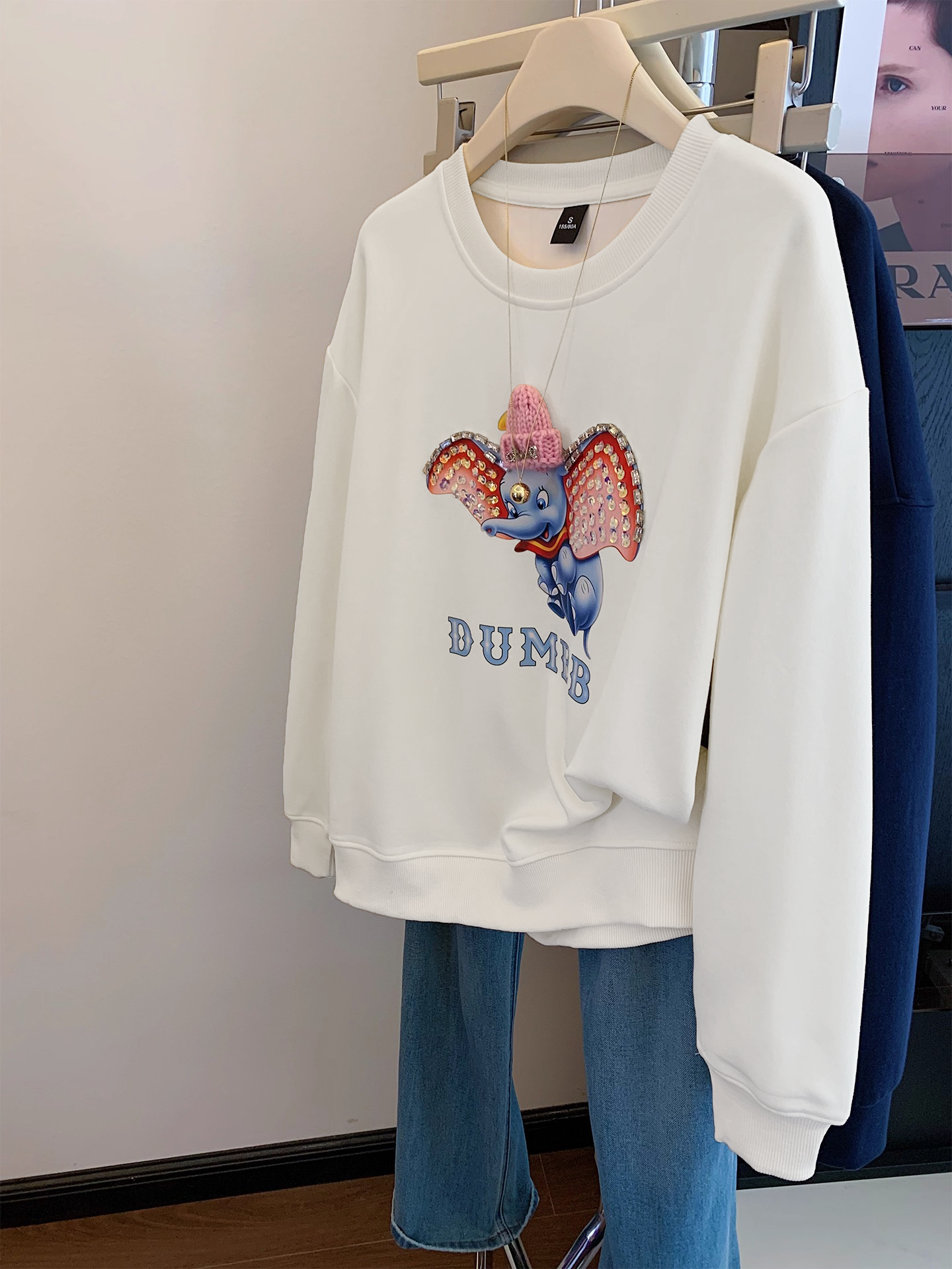 Dumbo Sweatshirt - with ears covered in shiny rhinestones and wearing a three - dimensional plush small hat