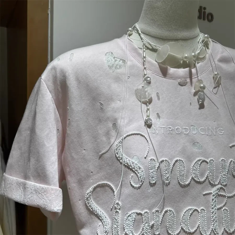 A137 - SS26 Designer Series: Intricate Lace & Embroidery Distressed Oversized Tee