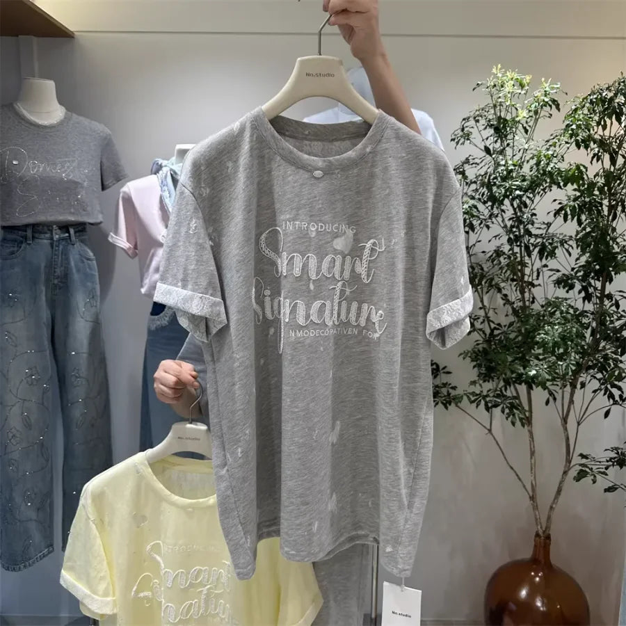 A137 - SS26 Designer Series: Intricate Lace & Embroidery Distressed Oversized Tee
