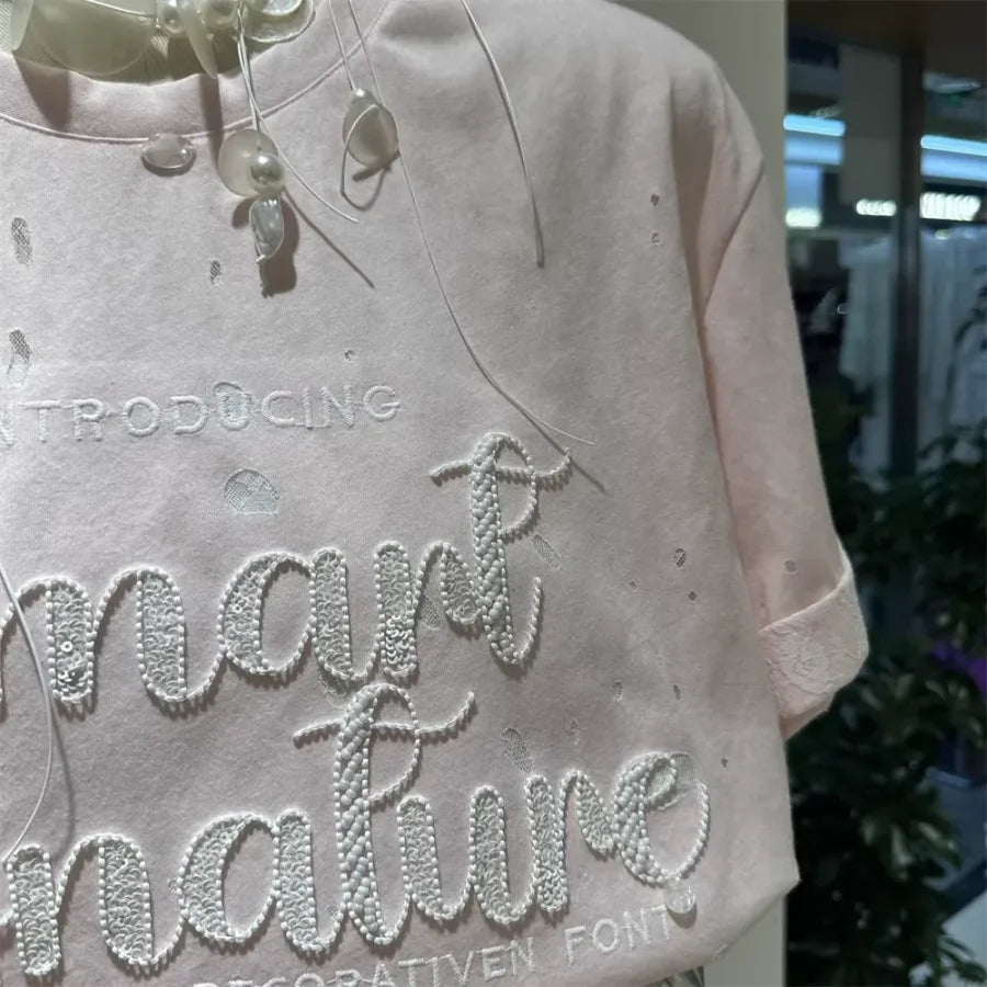 A137 - SS26 Designer Series: Intricate Lace & Embroidery Distressed Oversized Tee