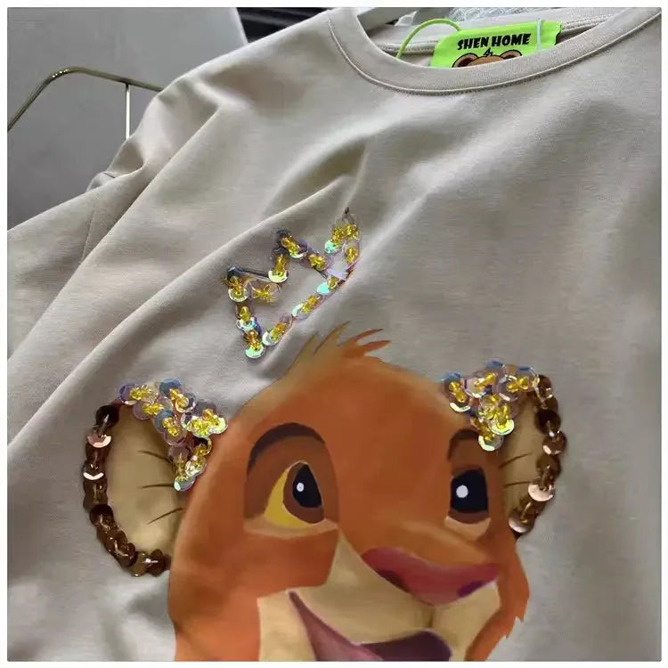 220g Cotton Simba Graphic Tee - Gold Sequin Crown & Ear Embellishments - Unisex