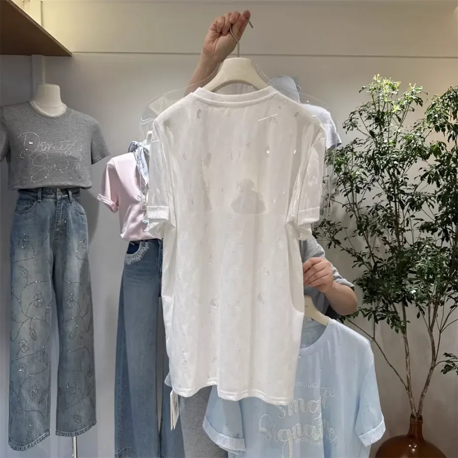 A137 - SS26 Designer Series: Intricate Lace & Embroidery Distressed Oversized Tee