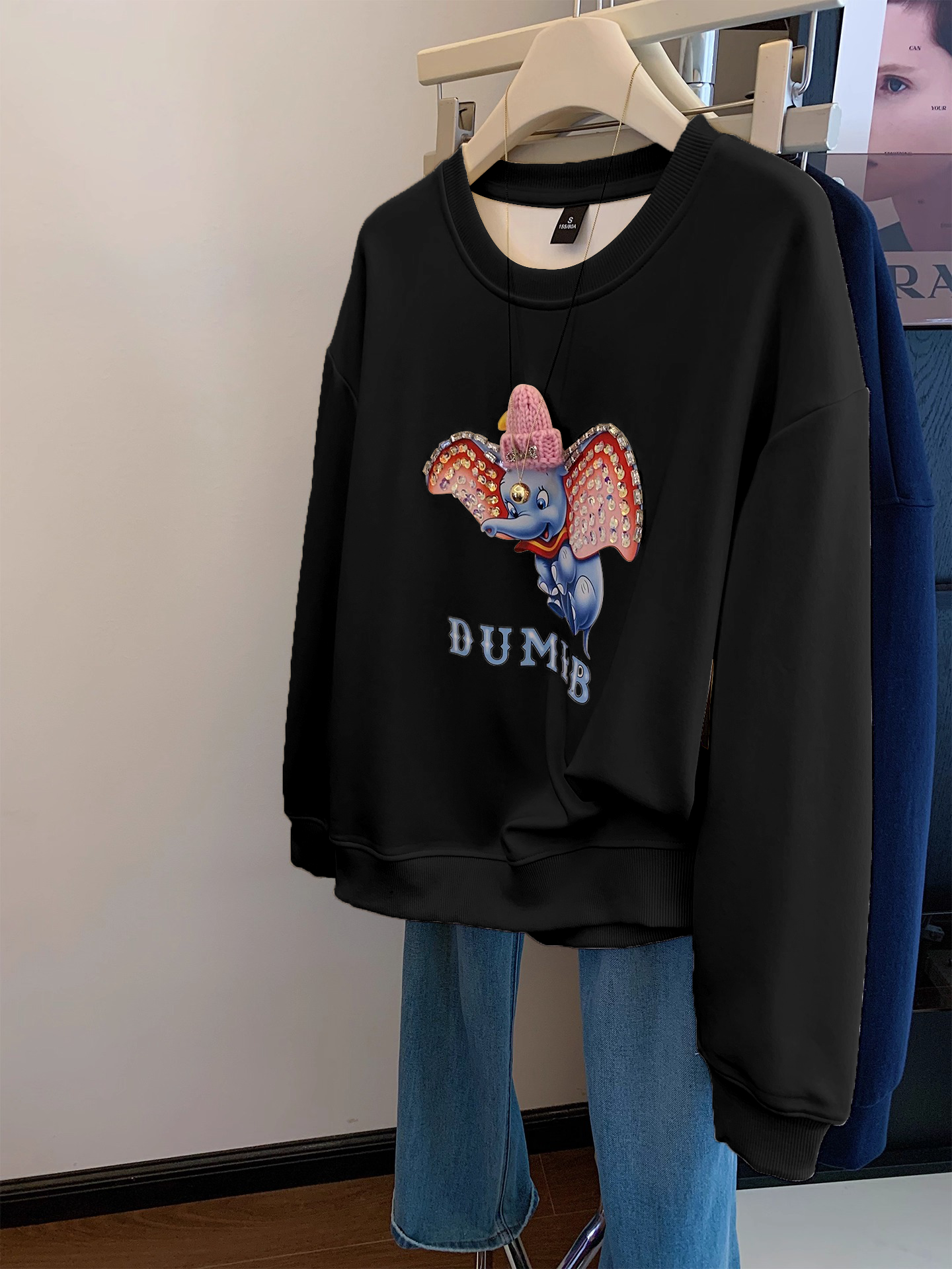 Dumbo Sweatshirt - with ears covered in shiny rhinestones and wearing a three - dimensional plush small hat