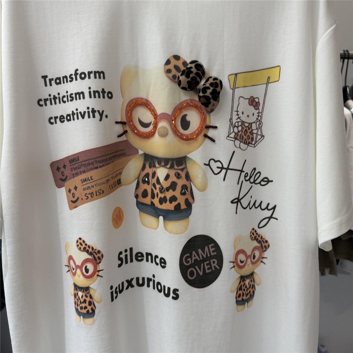 A234 - Hello Kitty Leopard Print T-Shirt with 3D Plush Bow – Hand-Beaded Crystal Embellished Short Sleeve Tee