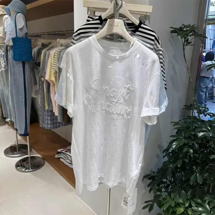 A137 - SS26 Designer Series: Intricate Lace & Embroidery Distressed Oversized Tee
