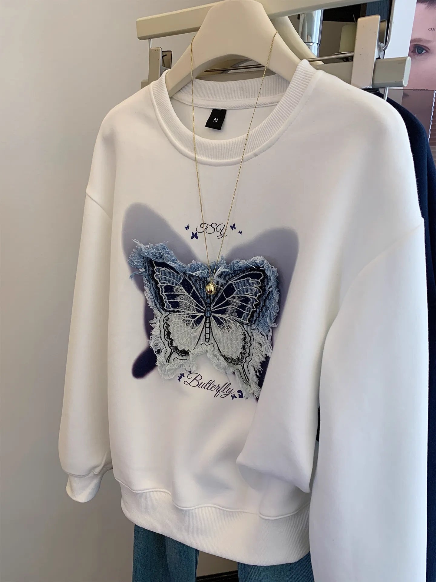 Casual Streetwear: White Sweatshirt w/ Denim Butterfly Patch
