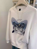 Casual Streetwear: White Sweatshirt w/ Denim Butterfly Patch