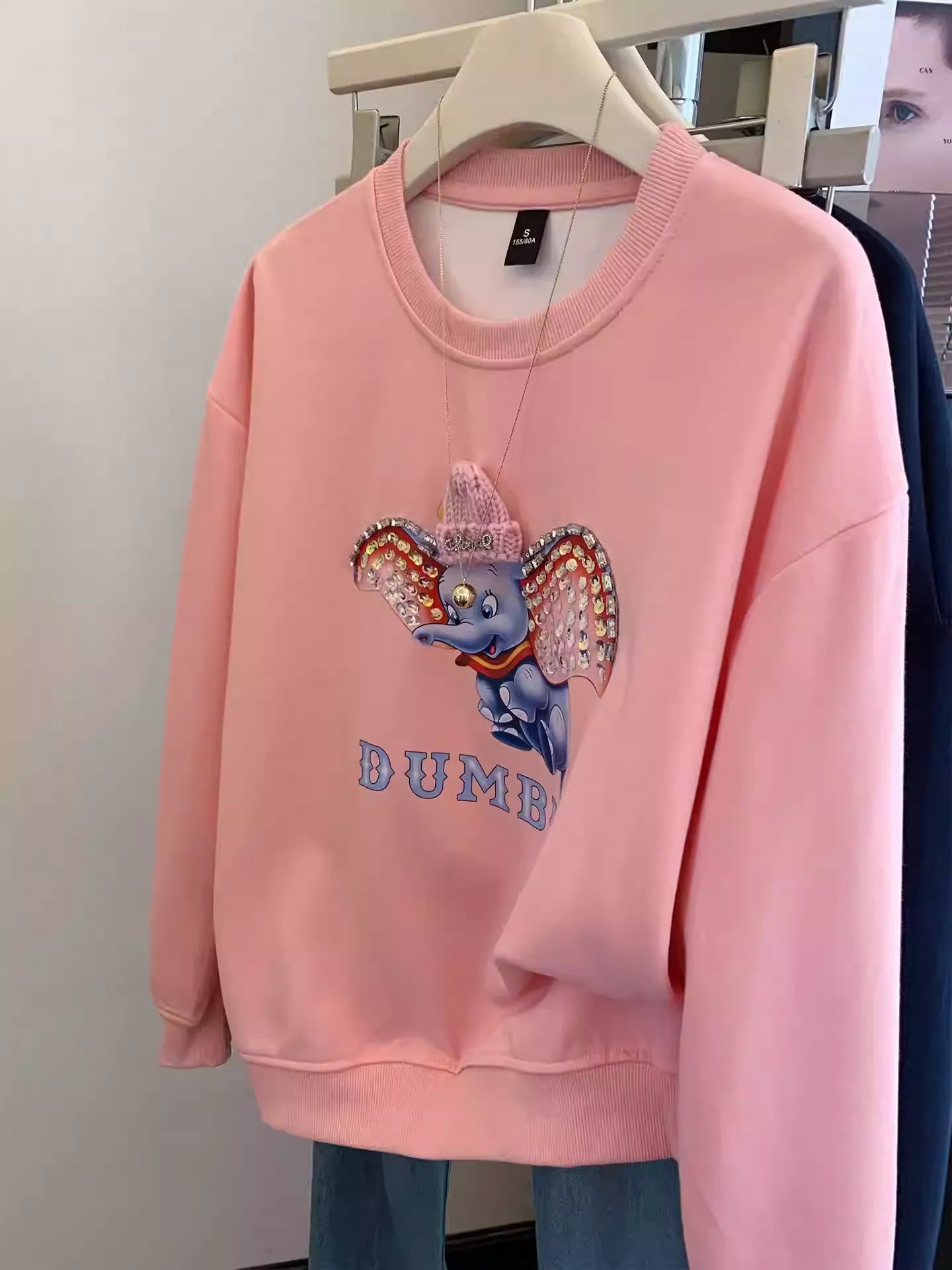 Dumbo Sweatshirt - with ears covered in shiny rhinestones and wearing a three - dimensional plush small hat