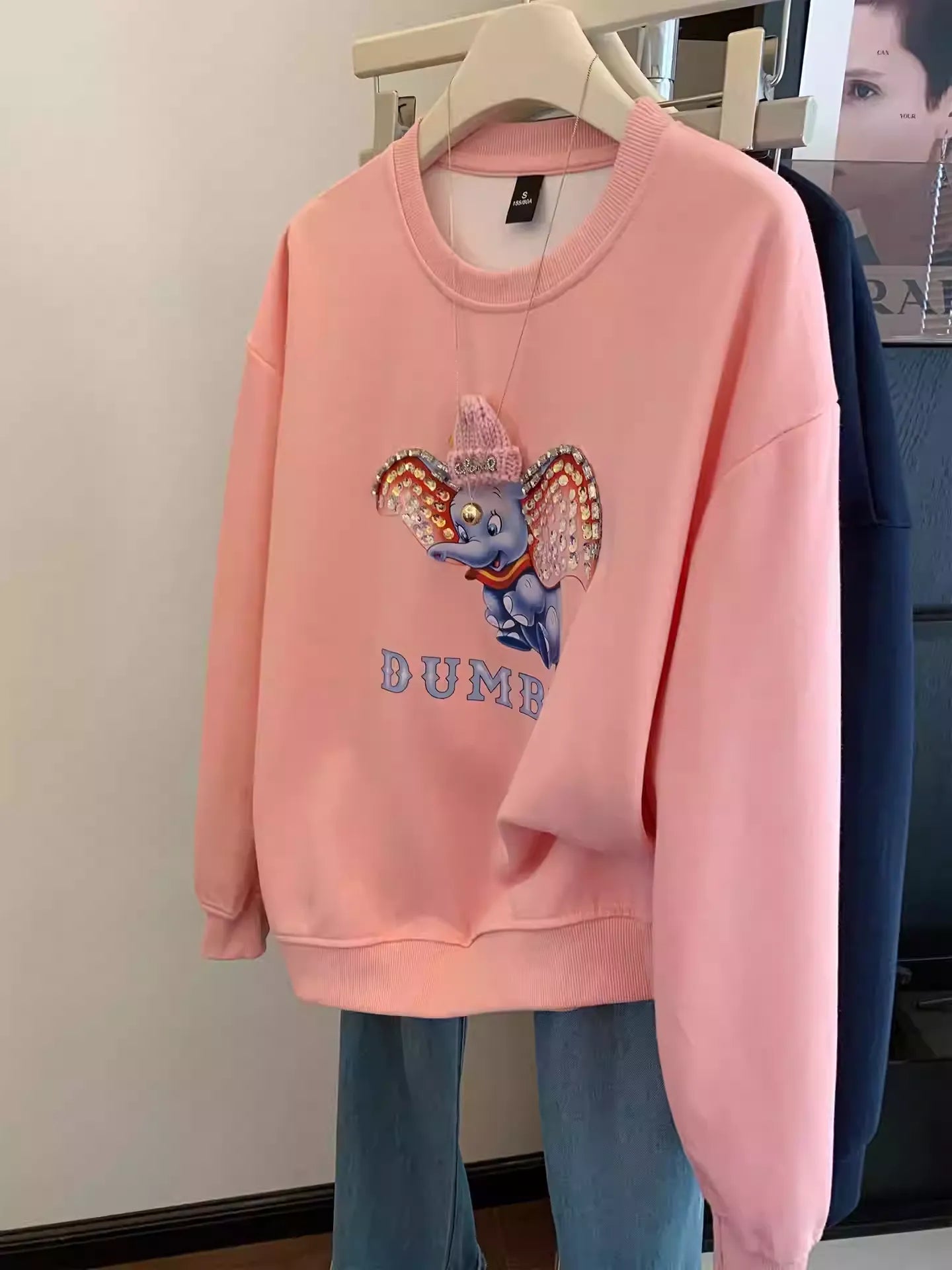 Dumbo Sweatshirt - with ears covered in shiny rhinestones and wearing a three - dimensional plush small hat