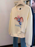 Dumbo Sweatshirt - with ears covered in shiny rhinestones and wearing a three - dimensional plush small hat